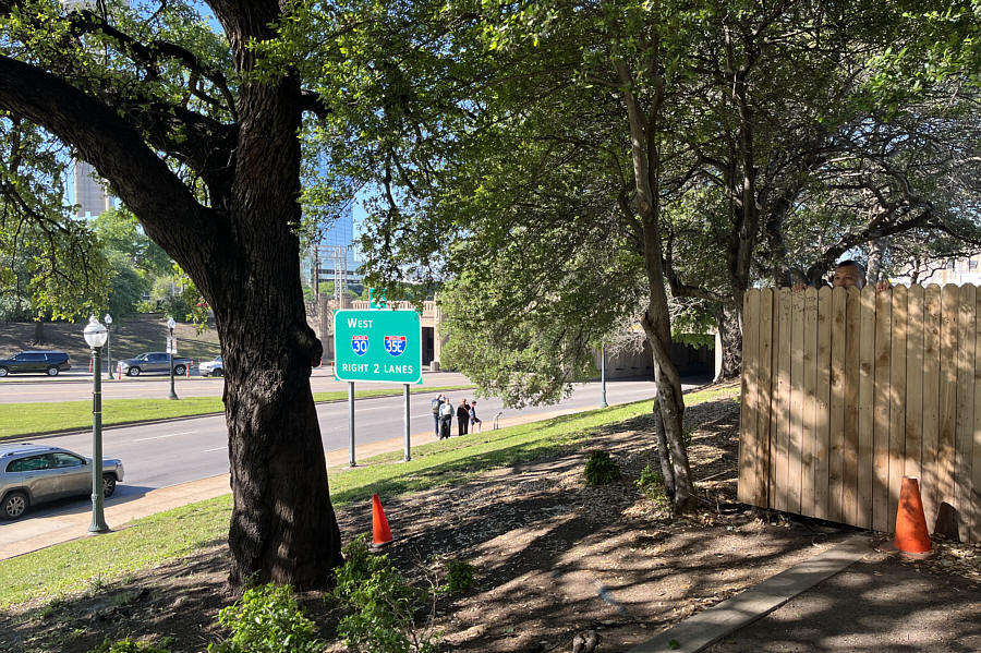 If you wanted to shoot at a moving target on the road, where would be the better sniper location, the 6th floor of a building or a fence near the road? Hmm...