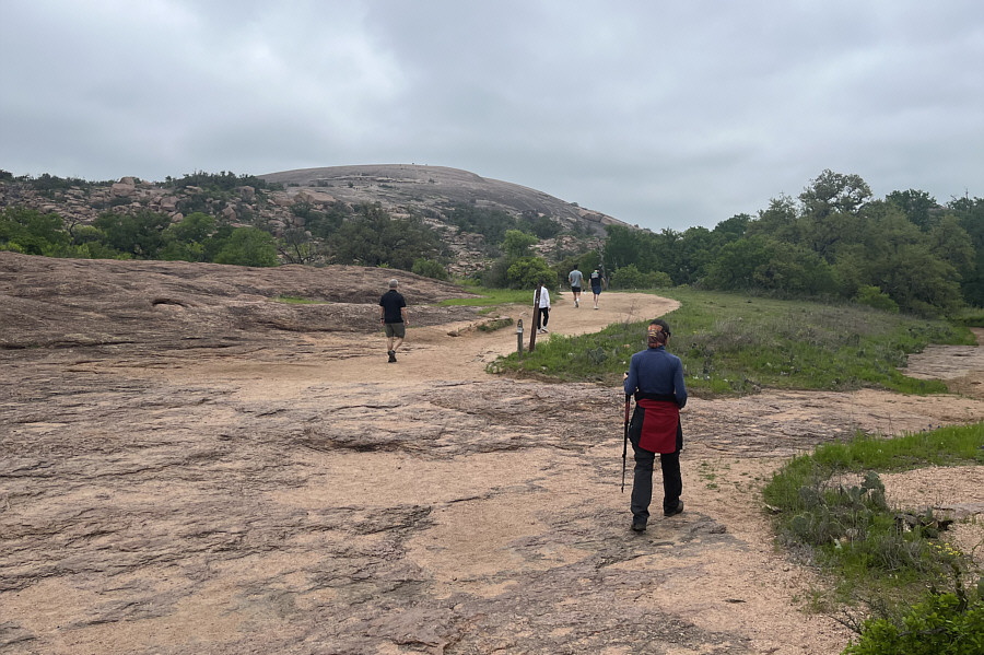 See the hikers already at the top?