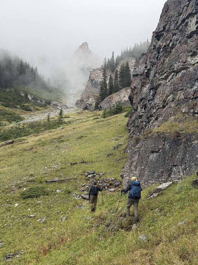 The grassy slope is actually more rocky than it appears.