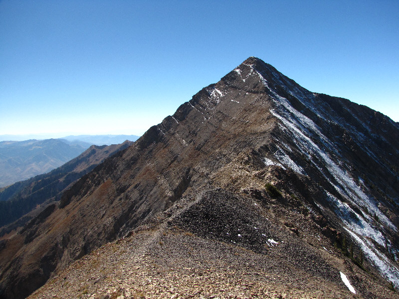 The outlier has an elevation of at least 3487 metres.