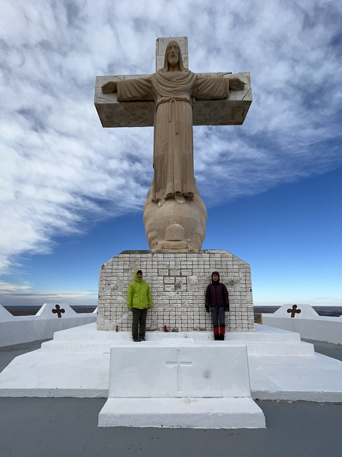 The statue of Jesus faces east on the mountain.